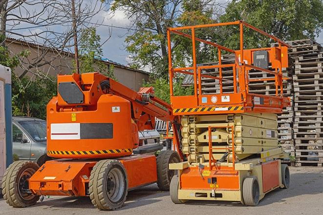 industrial forklift in use at a fully-stocked warehouse in Albion